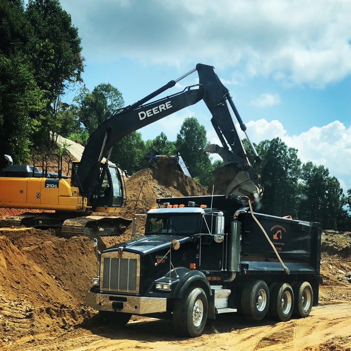 Brown's Excavating machine on a mountain job site